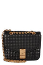 CELINE Quilted Leather Handbag with Flap Closure