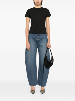 ALAÏA High-Waisted Barrel-Leg Faded Denim Jeans