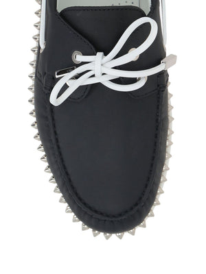 CHRISTIAN LOUBOUTIN Sleek Leather Boat Shoes with Stud Embellishments