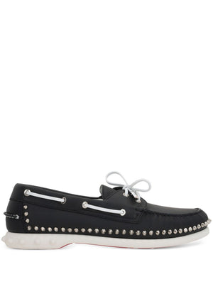 CHRISTIAN LOUBOUTIN Sleek Leather Boat Shoes with Stud Embellishments