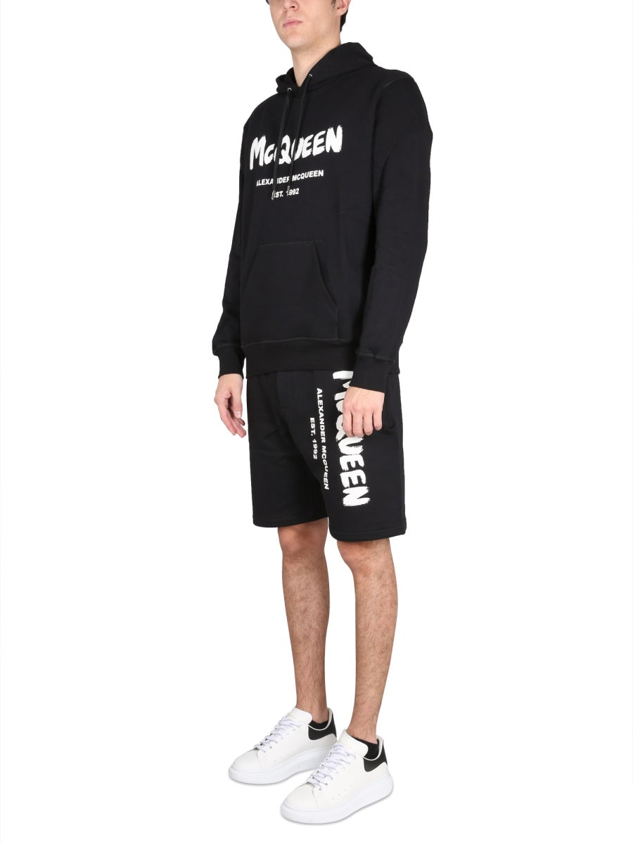 ALEXANDER MCQUEEN Mini Bermuda Shorts with Graffiti Logo Print