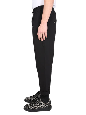 BALMAIN Sleek Wool Trousers with Hidden Front Zipper Closure