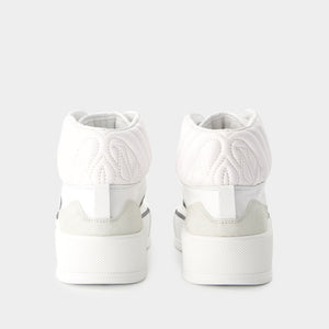 ALEXANDER MCQUEEN メンズ用大きめ白スニーカー - SS24コレクション