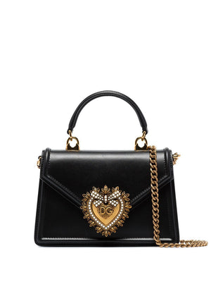 DOLCE & GABBANA Elegant Leather Handbag with Sacred Heart Plaque