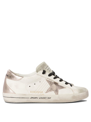 GOLDEN GOOSE ヴィンテージ風スニーカー、ピンクの星とシルバーのアクセント