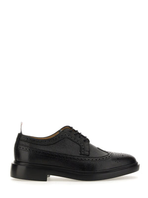 THOM BROWNE Stringata Longwing Brogue for Men