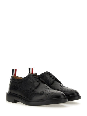 THOM BROWNE Stringata Longwing Brogue for Men